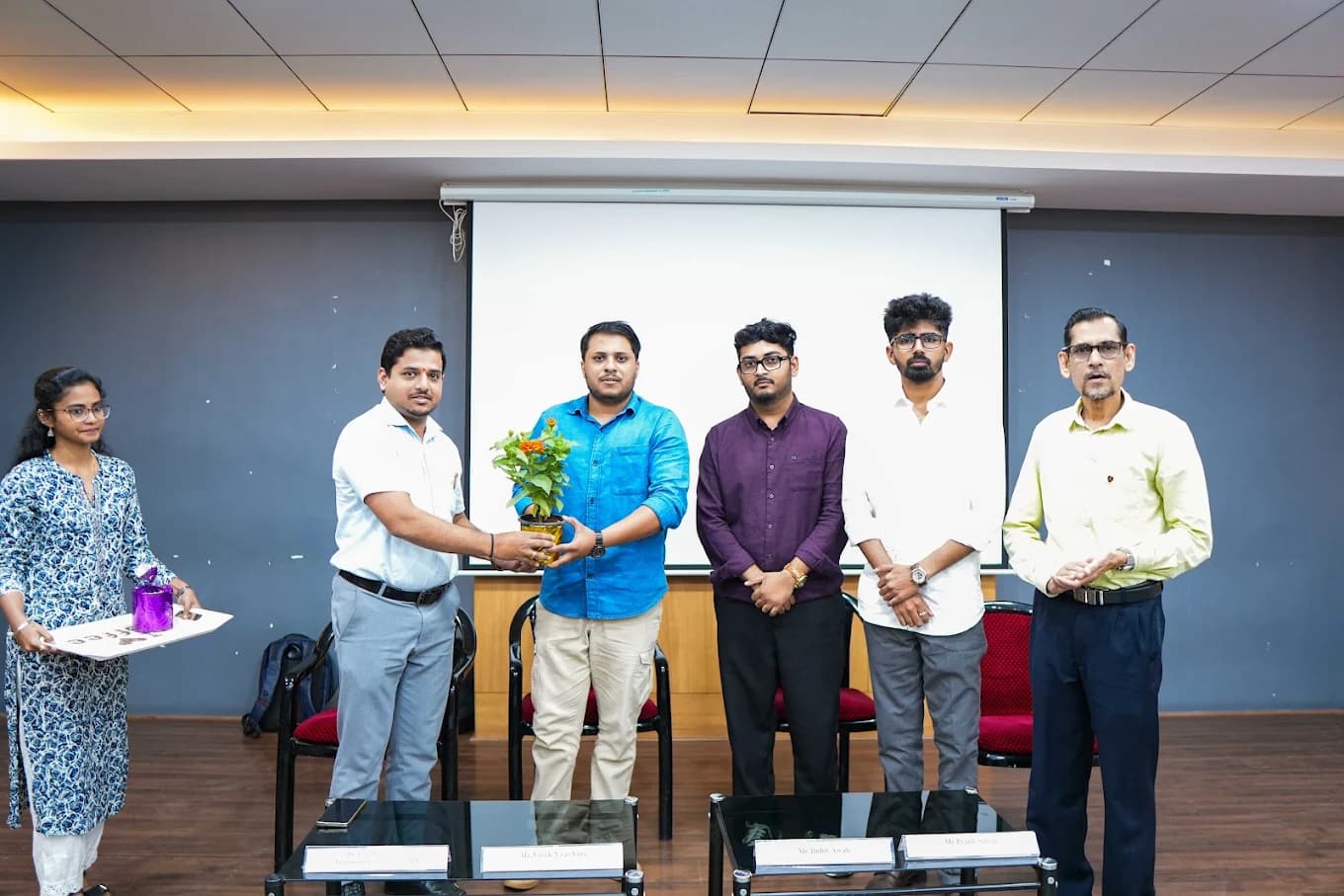 Felicitation of mentors at a college session